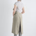 apron_linoelina_A611_manon_flax_model_backstyle